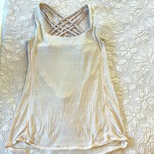 lululemon light support yoga tank with built in bra. Size 8, light pink